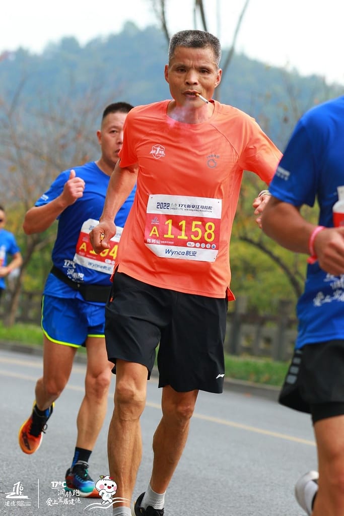 uncle chen 50 year old smoking while running a marathon